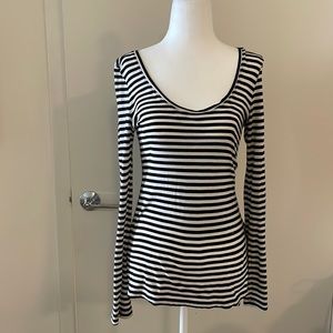 Long sleeved black and white striped shirt